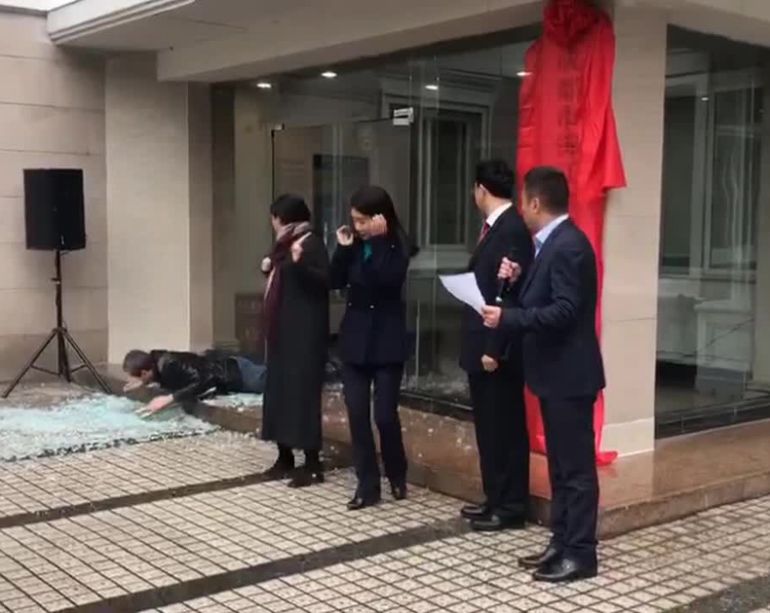 Man walks through door during ceremony